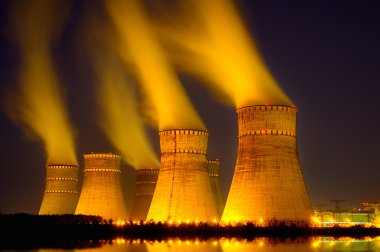 The cooling towers at night of the nuclear power generation plan clipart