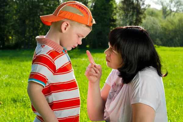 Mother scolding her son — Stock Photo, Image