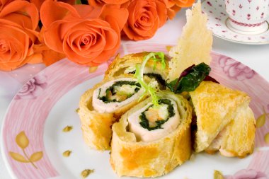 Baked chicken roll in pastry clipart