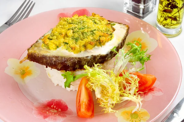 Steak of fish with rice garnish — Stock Photo, Image