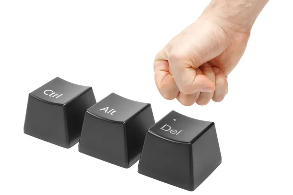 stock image Hand in a fist push the delete key, button alt, ctrl