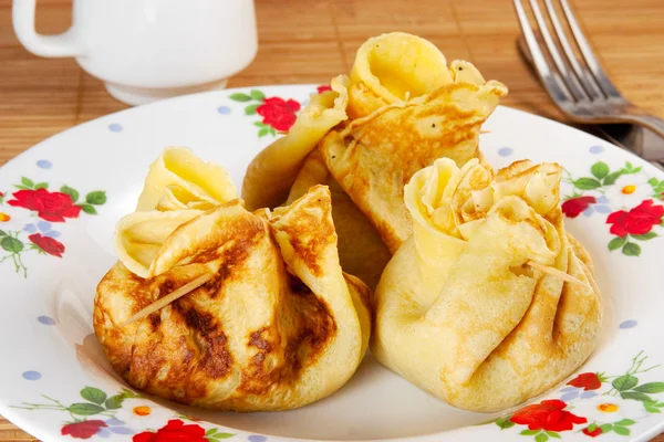 Delicious pancakes with filling — Stock Photo, Image