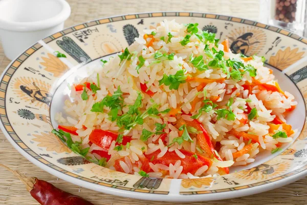 Vegetable risotto made of carrot, red bell pepper — Stock Photo, Image