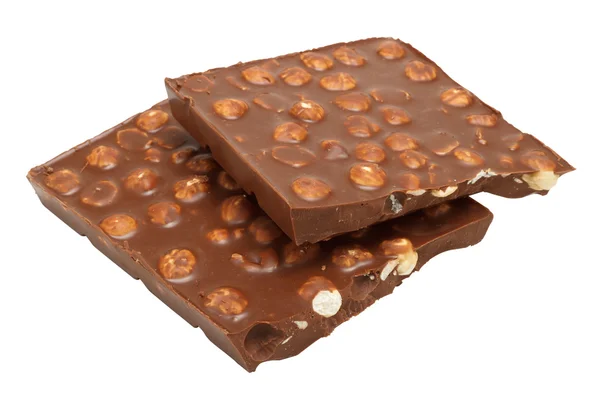 Two halves of broken chocolate with hazelnuts isolated — Stock Photo, Image
