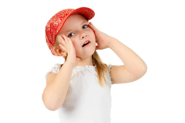 Ausdrucksstark überrascht kleines Mädchen hält ihr Gesicht — Stockfoto