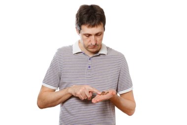 Man counting small coins - poverty, hardship concept clipart