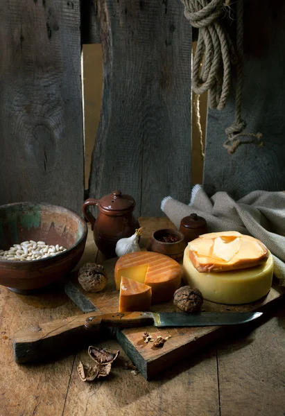 Rustic still life with cheese — Stock Photo, Image