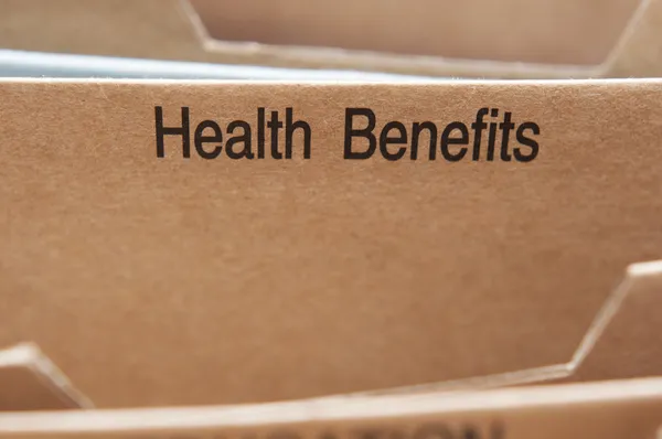 Health Insurance Benefits section tab in folding file. — Stock Photo, Image