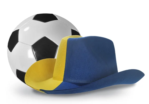 Yellow-blue cowboy hat and soccer ball — Stock Photo, Image
