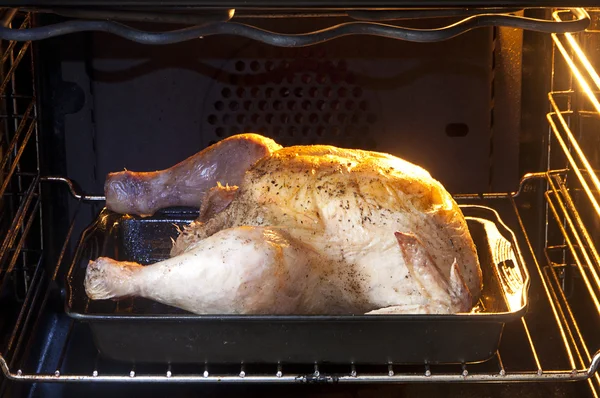 stock image Chicken in oven