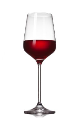 Red wine in glass isolated on white clipart