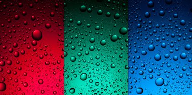 Water drops on red, green and blue backgrounds clipart