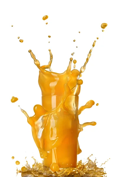 Splash χυμού από πορτοκάλι στο ποτήρι απομονωθεί σε λευκό — Φωτογραφία Αρχείου