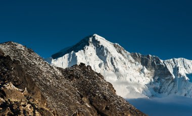 On top of Gokyo Ri: Peaks and clouds clipart