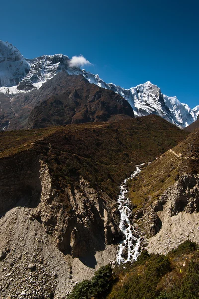 stock image Himalaya landscape: stream and snowed peaks