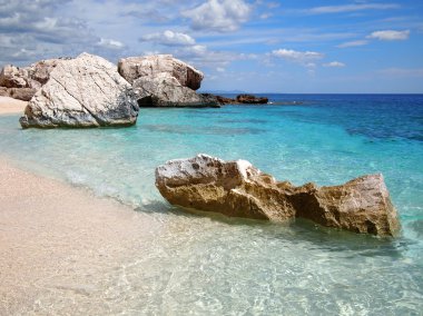Rocky beach in Sardinia clipart