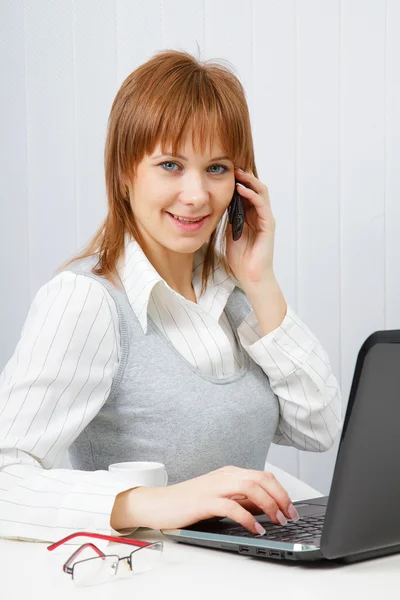 Attractive happy girl in office — Stock Photo, Image