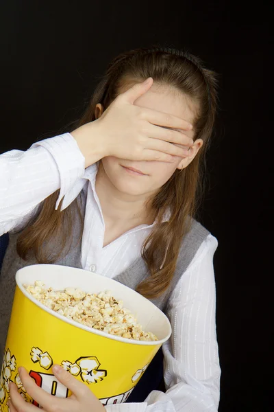 Girl in a movie theater — Stock Photo, Image