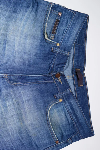 Грязные джинсы — стоковое фото