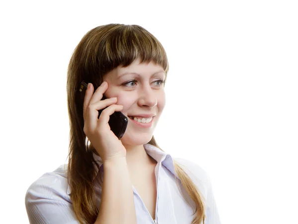 Mujer joven hablando en un teléfono celular —  Fotos de Stock