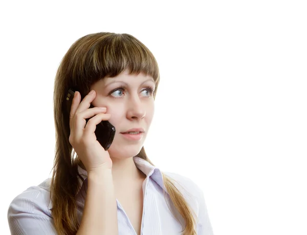 Mujer joven hablando en un teléfono celular —  Fotos de Stock