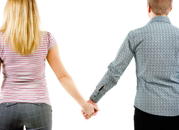 Um jovem casal segurando as mãos um do outro — Fotografia de Stock
