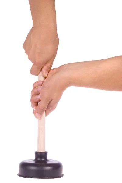 Рука тримає плунжер з дерев'яною ручкою — стокове фото