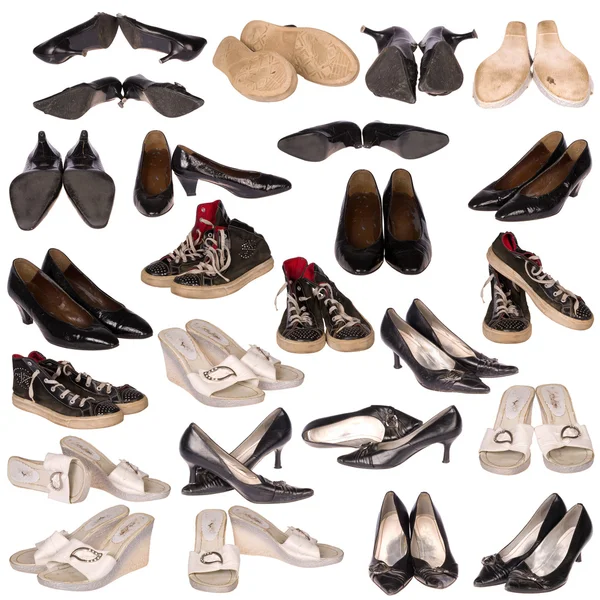 Muitas botas velhas em branco — Fotografia de Stock