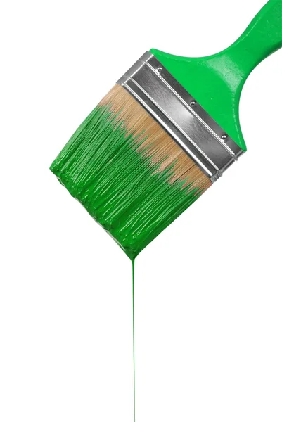 Bir fırça ile yeşil boya damlama — Stok fotoğraf