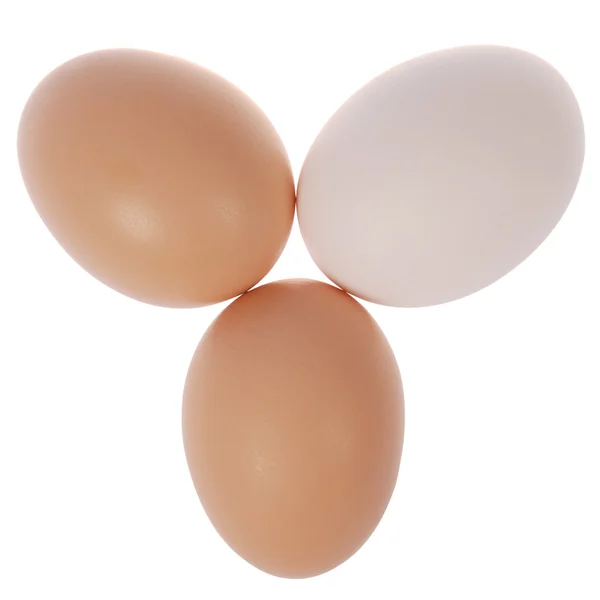 Tres huevos en círculo. Una clara de huevo . — Foto de Stock
