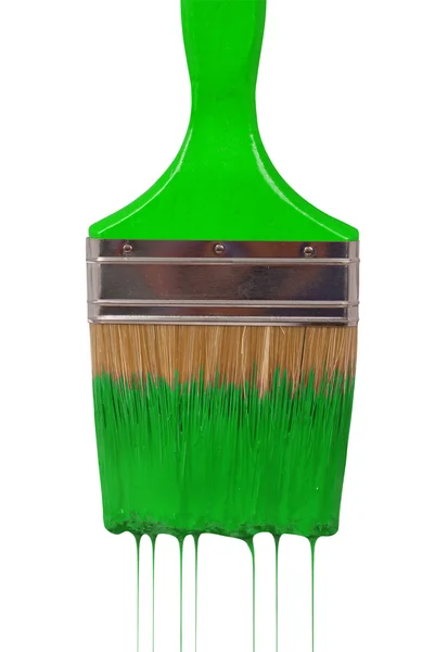 En pensel droppande med grön färg — Stockfoto