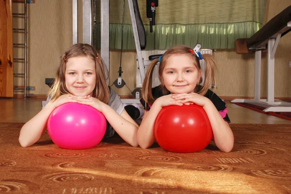 Stock image Two children posing in a gym.