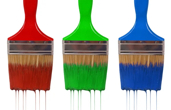 stock image A paintbrush dripping with rgb paint