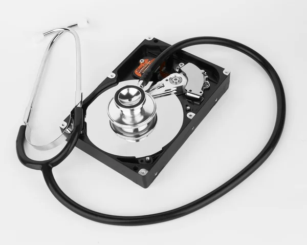 Computer hard drive and a stethoscope — Stock Photo, Image