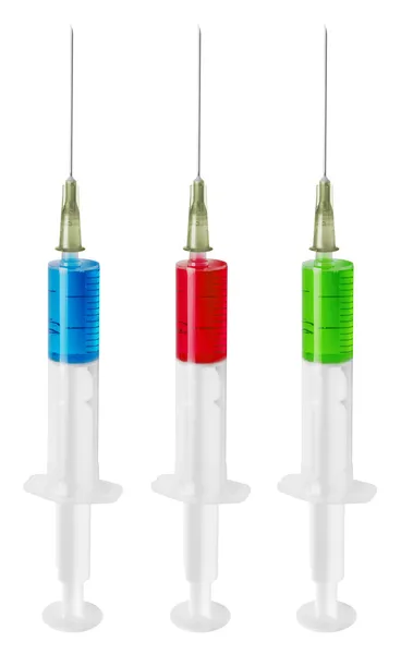 Three syringes with liquid — Stock Photo, Image