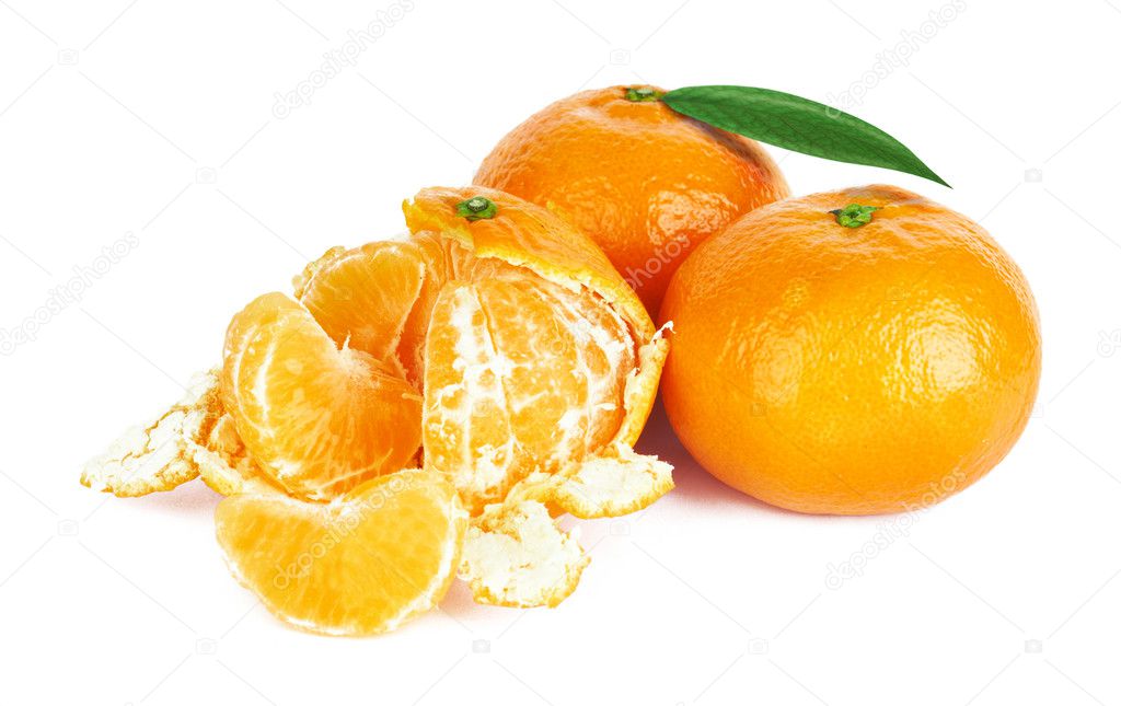 Fresh tangerine with leaves and segments