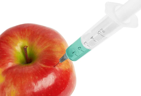 Red apple and syringes — Stock Photo, Image