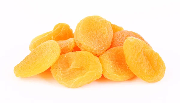 Sušené meruňky na bílém pozadí — Stock fotografie