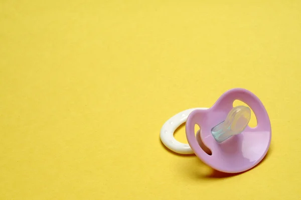 Dummy Pacifier on Yellow Background — Stock Photo, Image