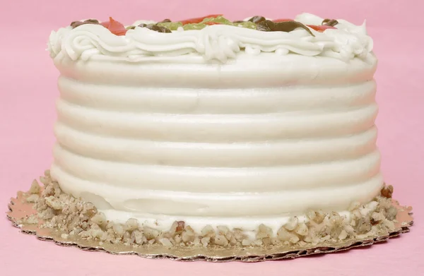 粉红色的背景上的生日蛋糕. — 图库照片