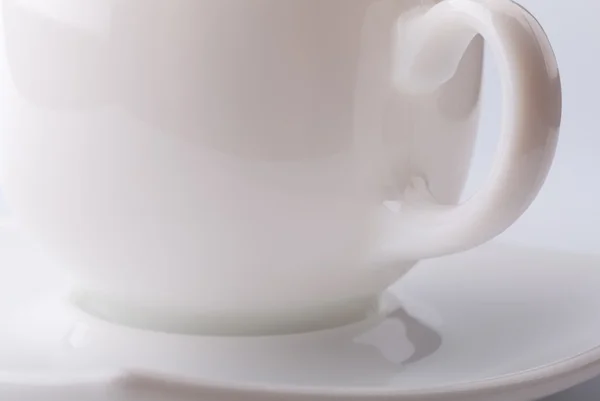 Una taza de café vacía sobre un fondo gris —  Fotos de Stock