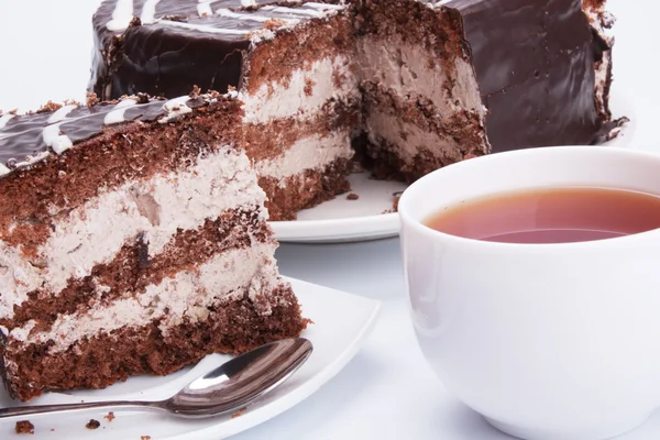 Chocolate cake and cup — Stock Photo, Image