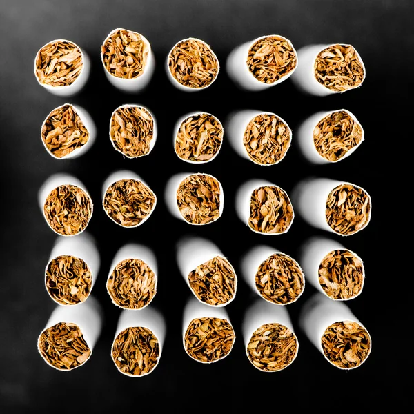 Abstract cigarettes background. Small DOF — Stock Photo, Image