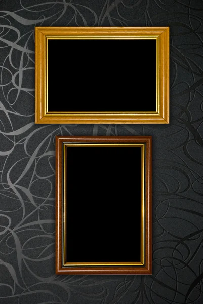 Gold frame on black vintage wallpaper background — Stock Photo, Image