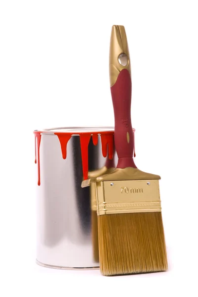 Can of red paint and professional brush on a white. — Stock Photo, Image