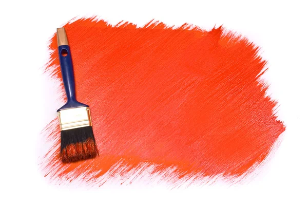 Brush with red paint on the white background — Stock Photo, Image