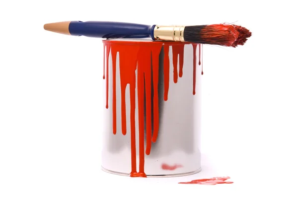 Can of red paint and professional brush on a white — Stock Photo, Image