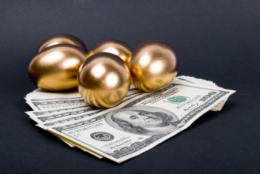 Golden eggs. A symbol of making money and successful investment clipart