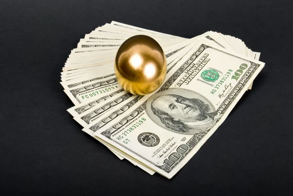 Golden eggs. A symbol of making money and successful investment — Stock Photo, Image