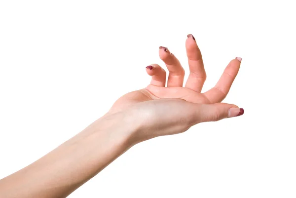 Kvinnans hand med manikyr på vit bakgrund — Stockfoto